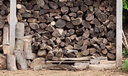 Large outdoor wood log store